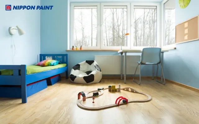 Góc thư giãn trong phòng trẻ em với tông màu nâu gỗ ấm cúng và gần gũi