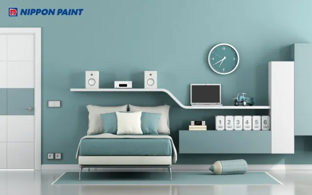 Thiết kế phòng ngủ với mảng tường xanh lam đậm tạo điểm nhấn hiện đại